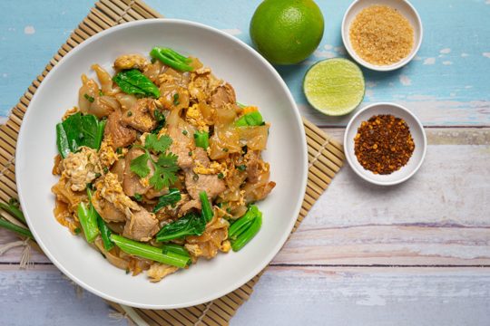 Fried noodle with pork in soy sauce and vegetable