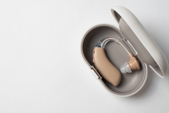 Hearing aids and case top view