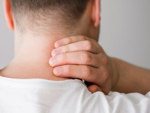 Close-up man with neck pain