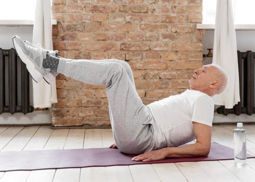 Full shot senior man training indoors